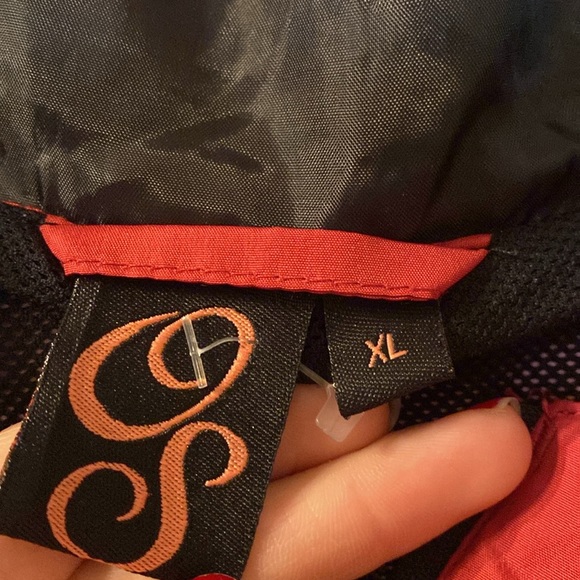 OS rain jacket that also folds into itself size XL - Picture 3 of 6